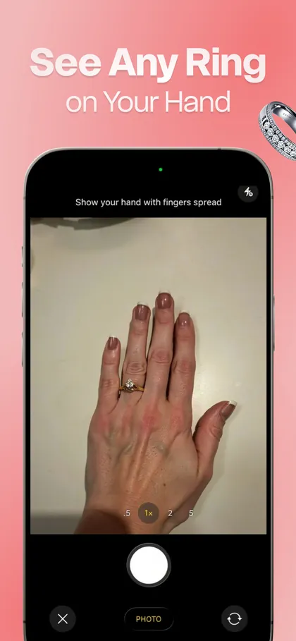 The camera capture screen prompting you to show your hand with fingers spread for AI virtual try-on